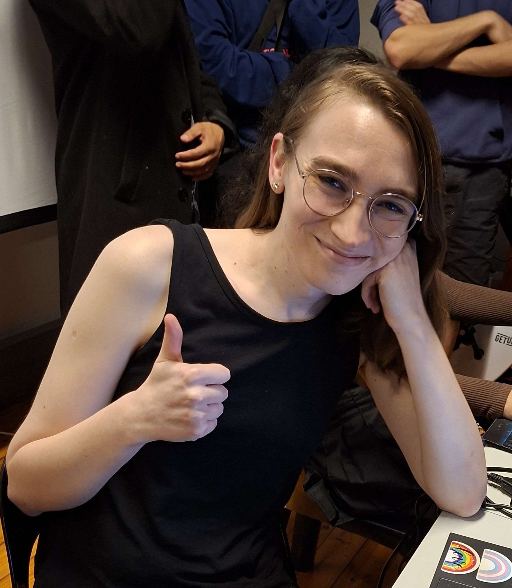 Ember Jones smiling and giving a thumbs up